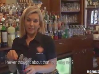 Bartender sucks peter behind counter