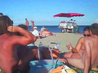 Milf Blows Her steady On Nude Beach By Voyeurs